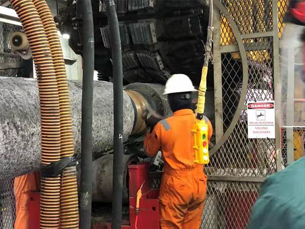 A worker is checking the subsea oil pipeline.