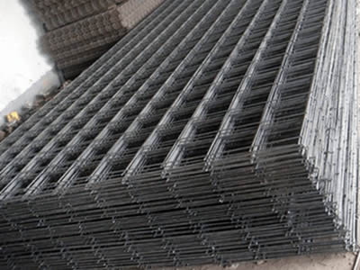 Many reinforcing welded wire mesh panels are placed together orderly in the warehouse.